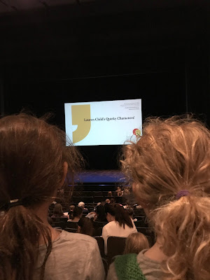 Two young female heads looking at the Sydney Writers Festival 2017 stage