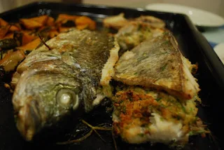Thieboudienne is an African seafood recipe from Senegal of stuffed fish and seasoned rice