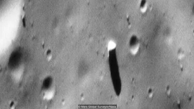 Phobos has got what some say is an artificial monolith on it.