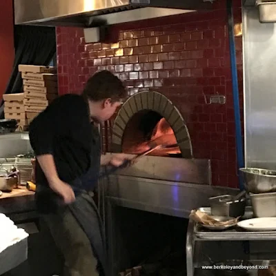 red tile pizza oven at Benchmark Oakland in California