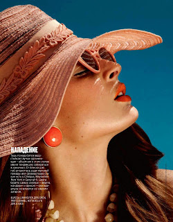 marie claire beauty, skin care, sun protection, model wearing hat, 
