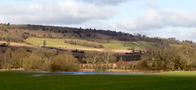 View across the Darent valley to Meenfield Wood and the war memorial, on the hillside opposite Shoreham, the next small town along the valley from Otford. 2 February 2013.