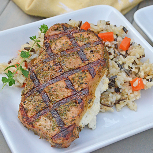 Roasted Garlic and Herb Pork Chops Stuffed with Boursin Cheese