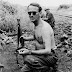 Swedish Major Eric Bonde smokes a cigarette after being ambushed and shot twice, Congo, 1961