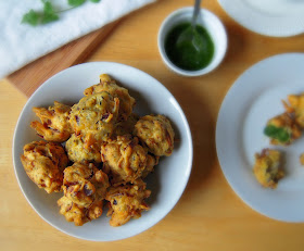 Onion Bhajjis are Indian savoury onion fritters made primarily with onion slices and chickpea flour. Check out my recipe for onion bhajji here.