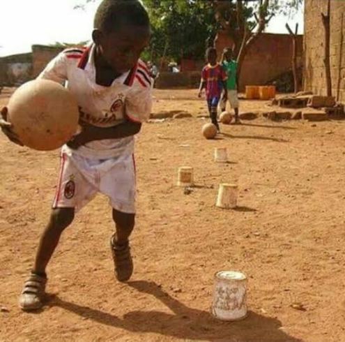 Super Eagles Striker Sunday Mba shares throwback pic of him playing football as a child 