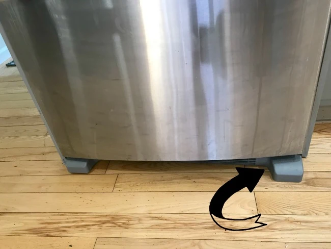 The HomeRight Steam Machine for cleaning under the refrigerator