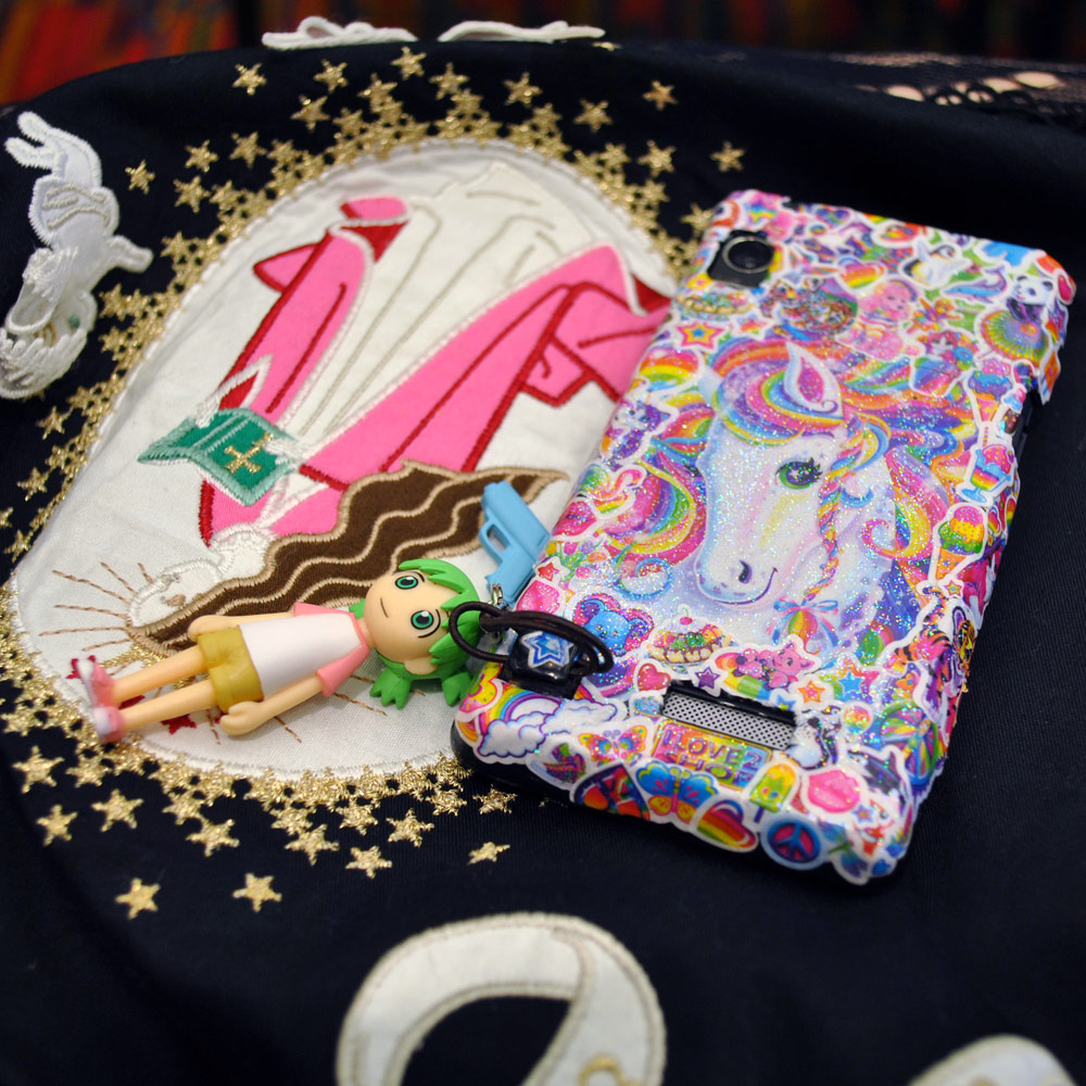 My Lisa Frank phone case, Yotsuba cell strap, and Baby the Stars Shine Bright dress! 