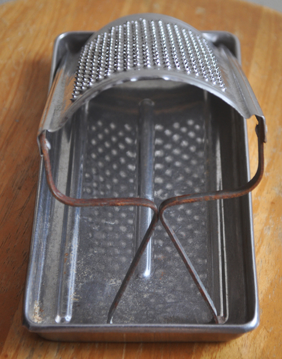 Italian grater for cheese, with tray