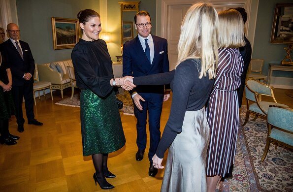 Crown Princess Victoria wore a metallic brocade skirt by Baum und Pferdgarten, and a black silk blouse by Rodebjer