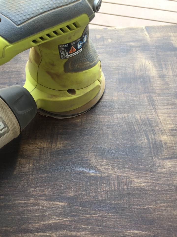An orbital sander quickly removes the old finish. An orbital sander quickly removes the old finish.