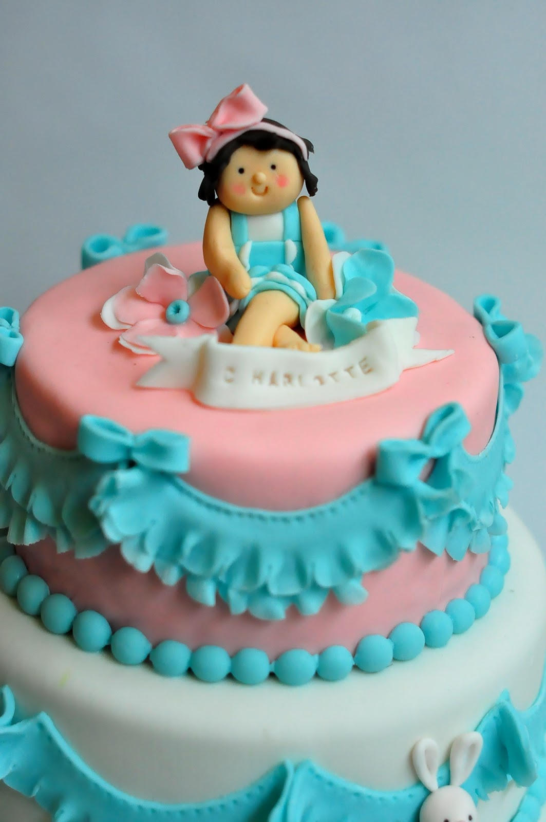 creamme pretty little girl tiered cake and cupcakes