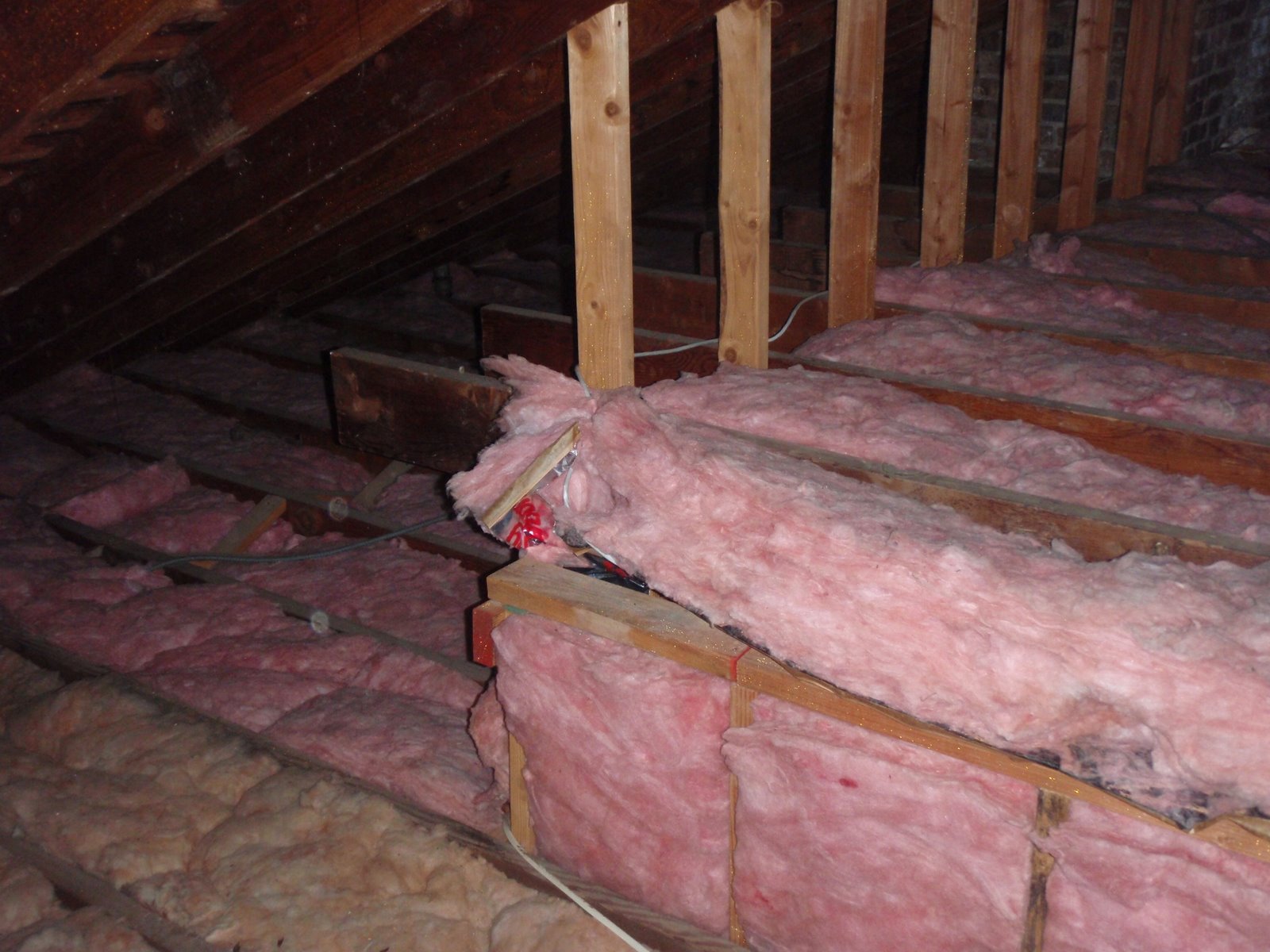 Home Pride Contracting Installing plywood in an attic