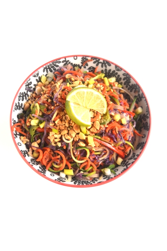 Spiralized Pad Thai is made with all vegetables and no noodles for a lighter, healthier dish! Tossed with a delicious spicy peanut sauce, you won't miss the noodles at all. www.nutritionistreviews.com
