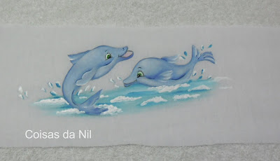 "golfinhos pintados em fralda "