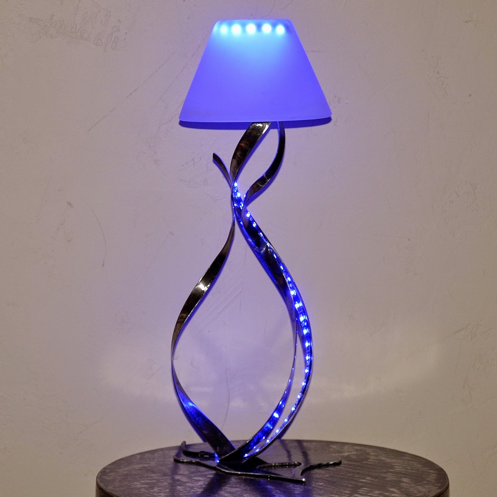 créateur d'objets déco en fer bougeoirs, luminaires