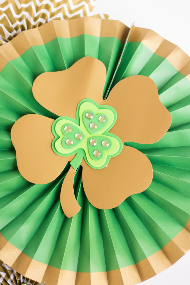 Make a St. Patrick's Day Wreath out of paper party fans! Make a St. Patrick's Day Wreath out of paper party fans!