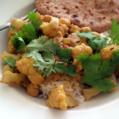 Cauliflower and Chickpea Curry:  A flavorful vegetarian curry made with cauliflower, chickpeas, and spices.
