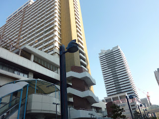 A streelight shaped like Tetsujin 28-Go (Gigantor)'s head seen near the giant 18 metre tall statue in the Nagata ward of Kobe