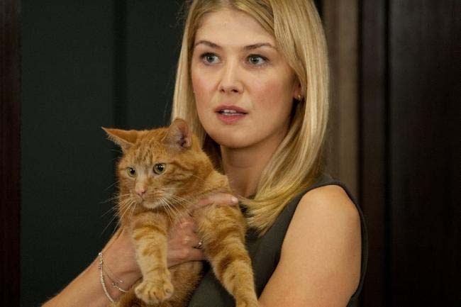 Watch a 'Johnny English Reborn' featurette and a new still of Rosamund Pike