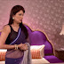 Hot TV Aunty Showing Sexy Navel in Transparent Saree