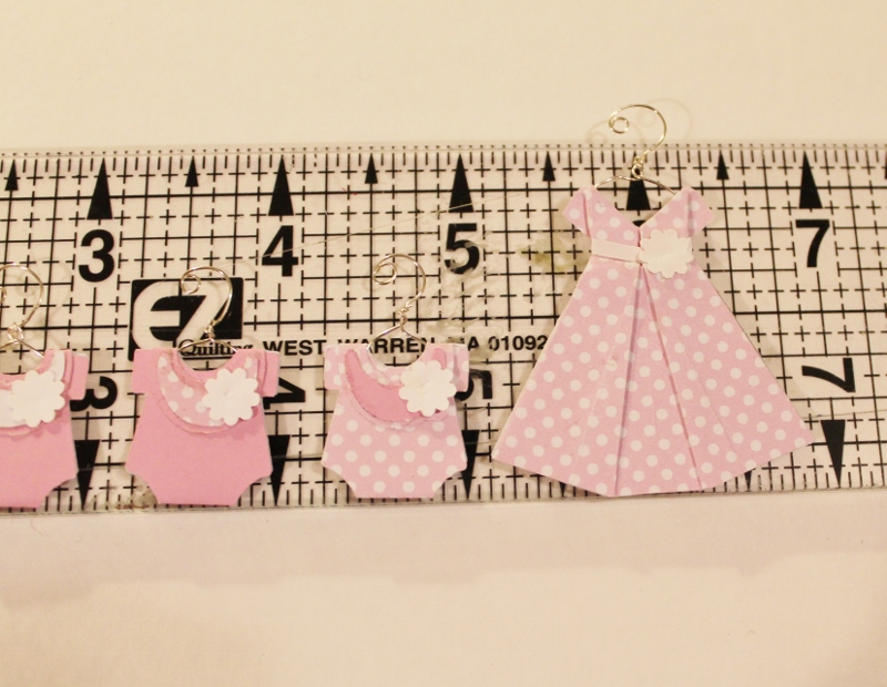 thealliancetrader design blog Origami dresses on hangers