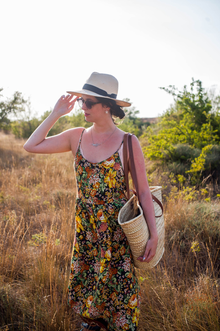 Outfit: floral midi dress and panama hat in the Provence