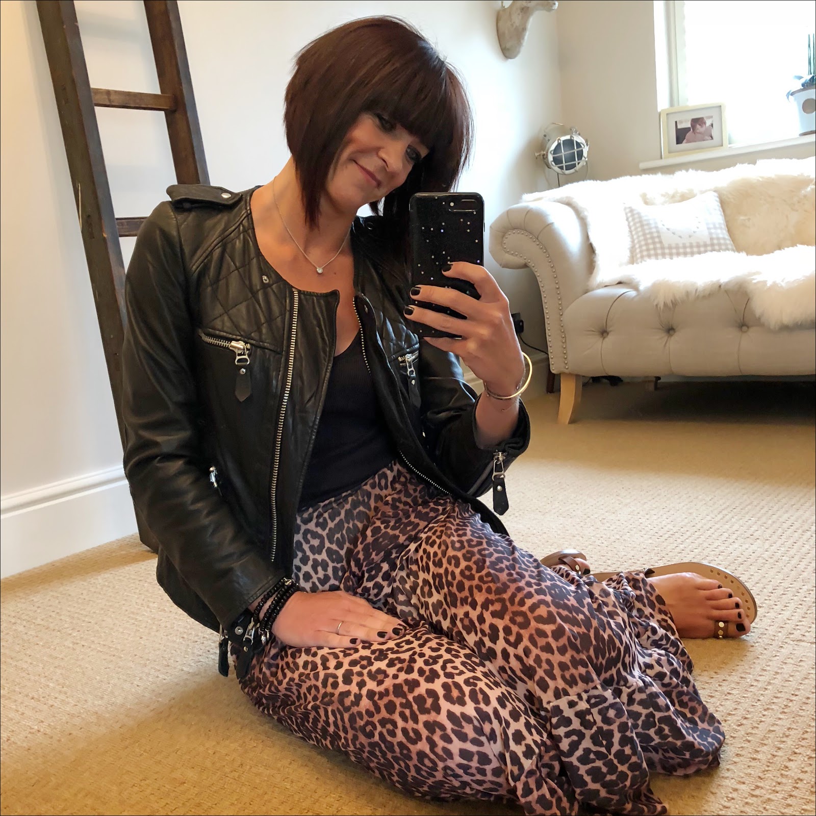 my midlife fashion, isabel marant etoile biker jacket, and other storied ribbed tank top, ganni leopard print mesh frill wrap skirt, basalt sarah summer cuoio studded sandals