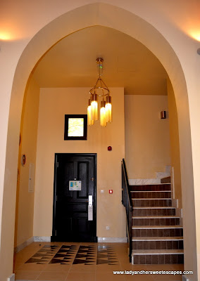 Foyer and staircase in a One-Bedroom Villa at The Cove Rotana