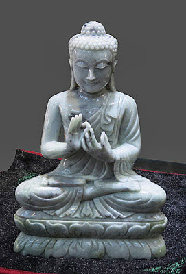 White Laughing Jade Buddha Statue sitting White Laughing Jade Buddha Statue sitting