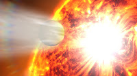Artist's impression of the evaporation of HD 189733b's atmosphere in response to a powerful eruption from its host star