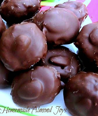 Photo of several homemade almond joys stacked on a plate - by cooking with K