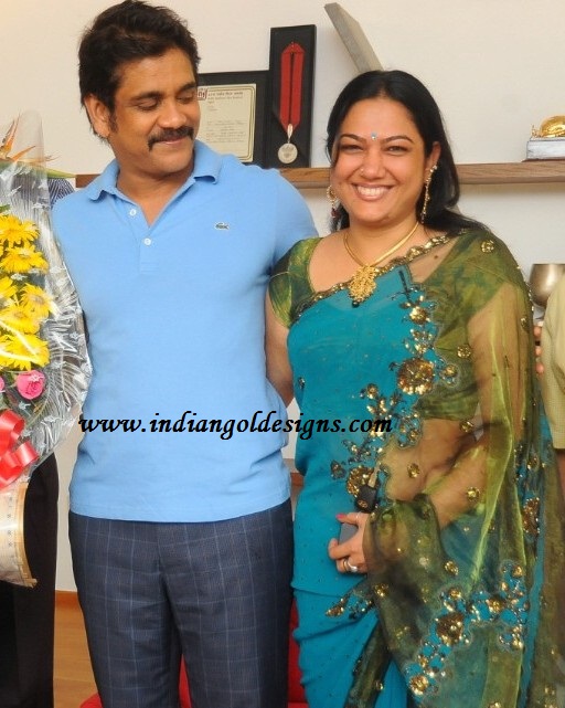 Gold and Diamond jewellery designs: telugu actress hema in gold necklace