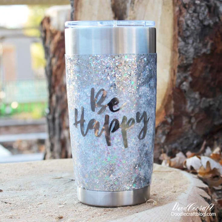 Make a glitter tumbler with cricut vinyl and high gloss resin, great for a gift