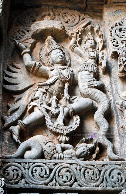 Garuda fighting with snake Garuda fighting with snake