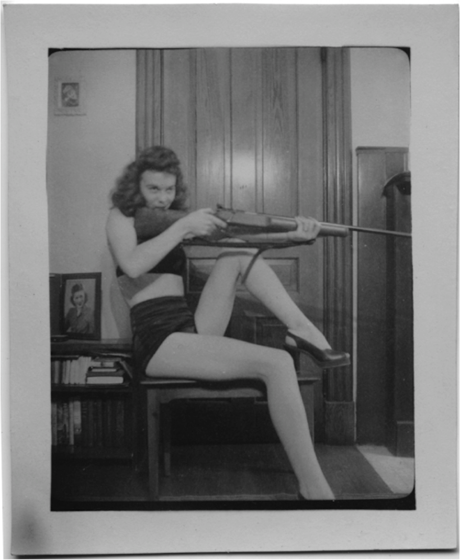 30 Interesting Vintage Photographs of Women Posing With Their Guns