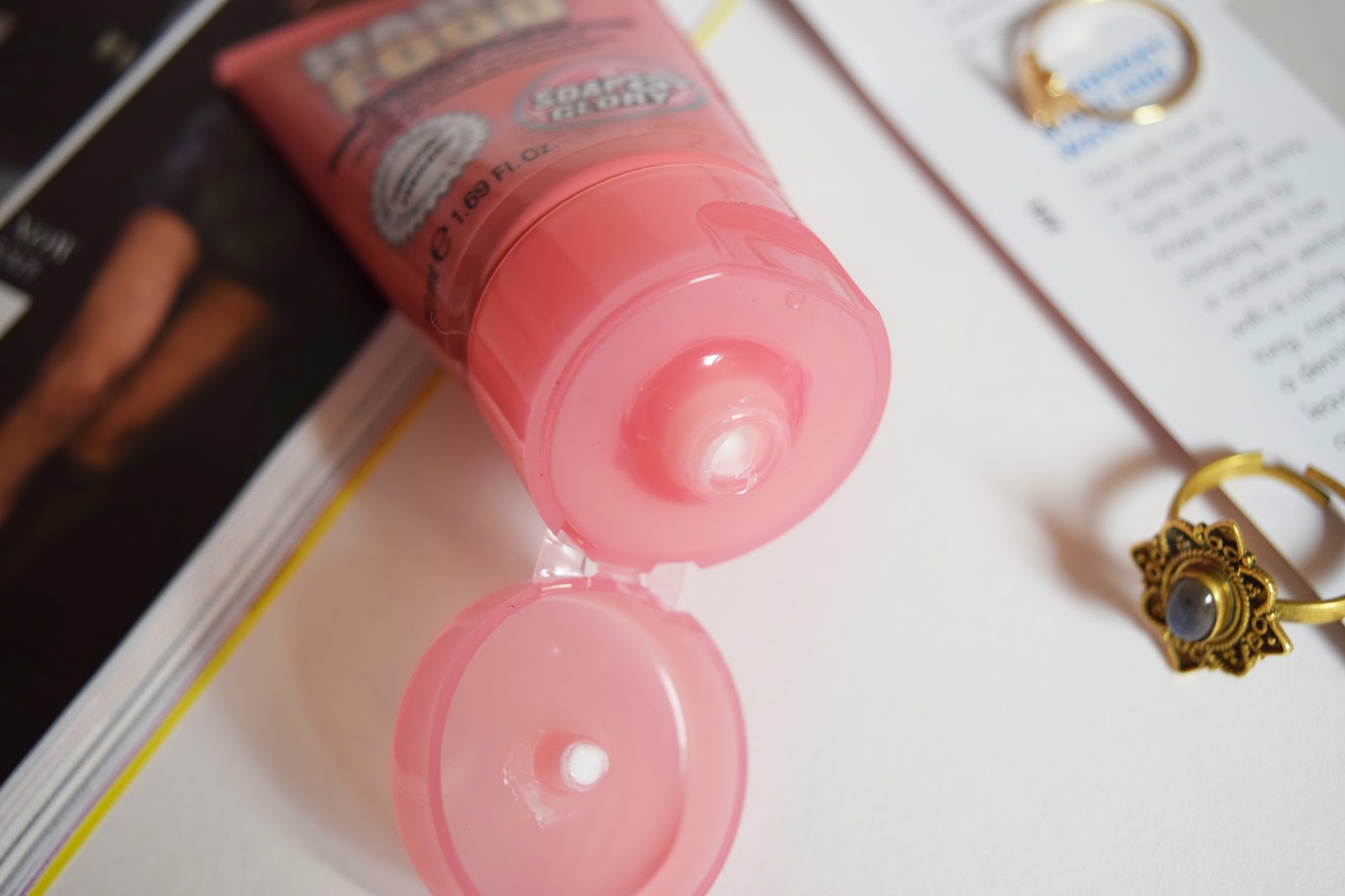 THE TUBE OF SOAP AND GLORY HAND FOOD WITH THE LID OPEN