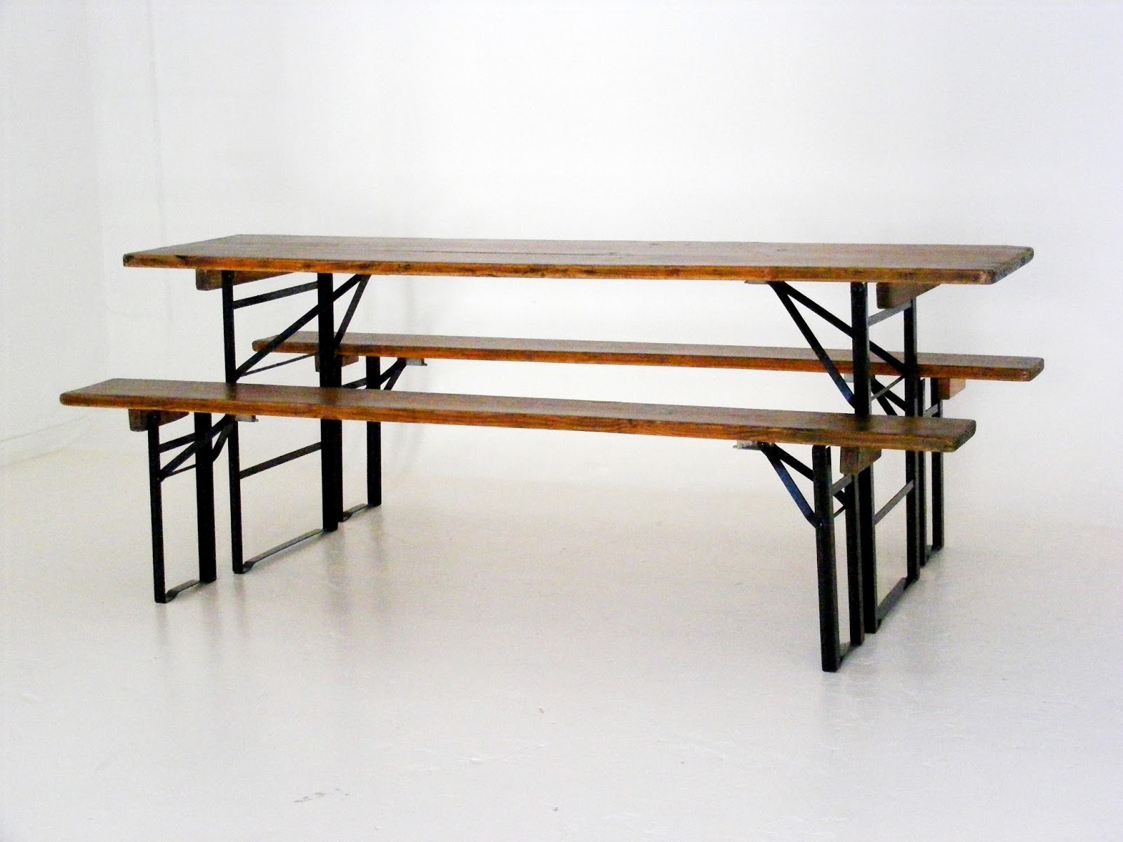 VAMP FURNITURE An industrial style vintage foldup table and 2 bench