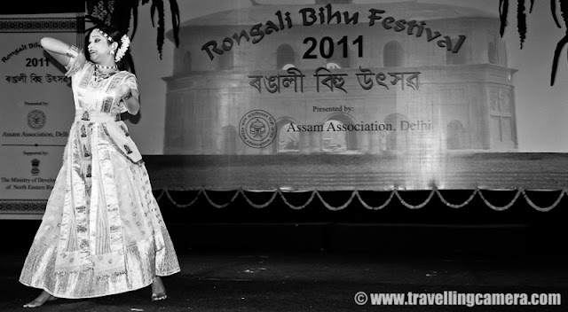 Sattriya Dance Performance during Rongali Bihu Festival @ Indira Gandhi national Center of Arts (organized by Assam Association, Delhi on 24th April 2011) : Posted by VJ SHARMA on www.travellingcamera.com : Sattriya Dance performances is one of the main highlight of Rogali Bihu Festival at IGNCA, Delhi ! And this performance was full of expressions and it seems these songs were telling some story which dancer was enacting through her steps !!!  Let's have a look at some of the photographs from Sattriya performance on 24th April, 2011 with relevant information about this particular form of Indian Classical Dance !!!Sattriya Nritya is one among eight principal classical Indian dance traditions. Whereas some of the other traditions have been revived in the recent past, Sattriya has remained a living tradition since its creation by the Assamese Vaishnav saint Srimanta Sankardeva, in 15th century AssamSankardeva created Sattriya Nritya as an accompaniment to the Ankiya Naat (a form of Assamese one-act plays devisdby him), which were usually performed in the sattras, as Assam's monasteries are called. As the tradition developed and grew within the sattras, the dance form came to be called Sattriya Nritya.The name 'Sattriya' has been derived from the word 'Sattra' which are religious Institutes set up by the Vishnava Saint Shrimanta Shankardev for preserving and propagation of tradition, culture and religion. It was coined centuries after and represents all that the Saint had created, which brought about a Socio-cultural Renaissance in the Assam Valley of INDIA !!!The Sattra style was evolved when Shankaradeva, a great artist and musician in himself composed 'Ankiya Bhaona' or 'Ankiya-Nat' (dance-dramas), devotional music- 'Borgeet', and the four sacred texts - “Kirtan', 'Dasam' 'Ghosa', 'Ratnavali' (the last two composed by Madhavdev). A School of Philosophical Learning emerged and a deeper understanding of life through the simple path of devotion brought one and all to the fold...Actually Sattriya dance of Assam is aclassical form of dance which is highly devotional in character with the spiritual aspect being predominant all through !!!This Dance form of Sattriya is like many of the other Classical Dance forms of India which has been extracted from a larger body of theatrical practices that constitute the Ankiya Bhaona form. References of this dance form can be found in the ancient Indian classical texts like the Natyashastra, the Kalikapurana, the Yoginitantra, and the Abhinayadarpana apart from many sculptures, and historical relicsThe musical Instruments that accompany a performance are the khols or the drums, the taals or the cymbals, the flute and the violin. Even though Sattriya dance is performed by bhokots or the male monks traditionally in monasteries...The popular forms of the Sattriya dance are Apsara Nritya, Behar Nritya, Chali Nritya, Dasavatara Nritya, Gosai Prabesh,  Nadu Bhangi, Manchok Nritya, Bar prabesha, Gopi Pravesha, Rasa Nritya, Rajaghariya Chali Nritya, and Sutradhara.While I was searching throuh all relevant information about this particular form of Indian Classical dance, I found a link where I saw the same artis.. Please have a look and she really looks the same. Isn't it? - http://www.mridusattriya.com/satt_dance.htmlThe Sattriya dance can be classified into two styles namely Paurashik Bhangi that is Tandav or masculine style and Shtri bhangi which is Lasya or feminine style !!!This was one of the interesting performance of the evening at Rogali Bihu Festival although colorful lighting spoiled my lot of photographs... I will be sharing some colorful shots of Sattriya Dance soon !!!Now I know another Indian Classical Dance form and loved the expressions of performer here !!!