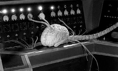 Still, a brain creature from Fiend Without a Face (1958)