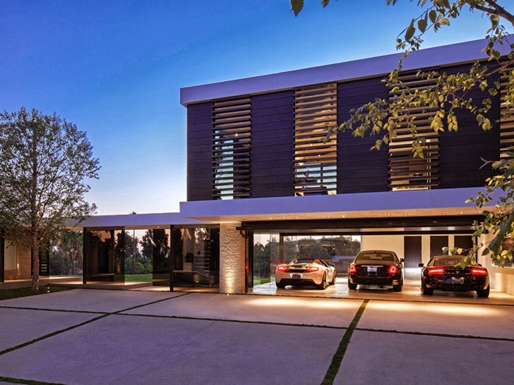 Garage with cars in Perfect modern mansion in Beverly Hills
