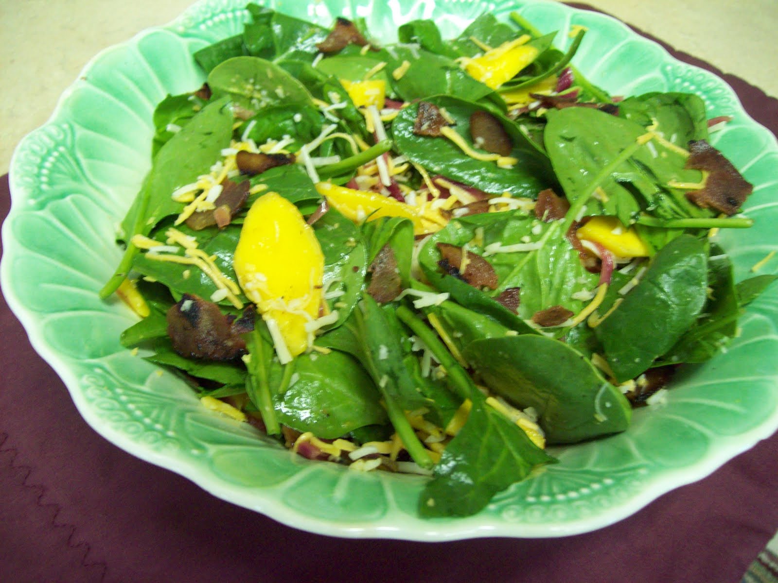 The Newfangled Country Gardener Fresh mango, warm bacon dressing gives