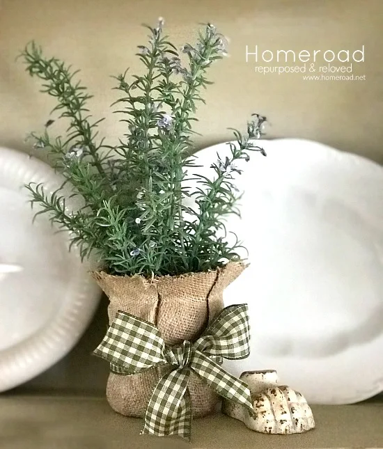 burlap vase with bow and plant and plates