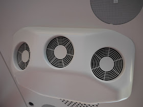 air conditioning unit inside a SkyCab car