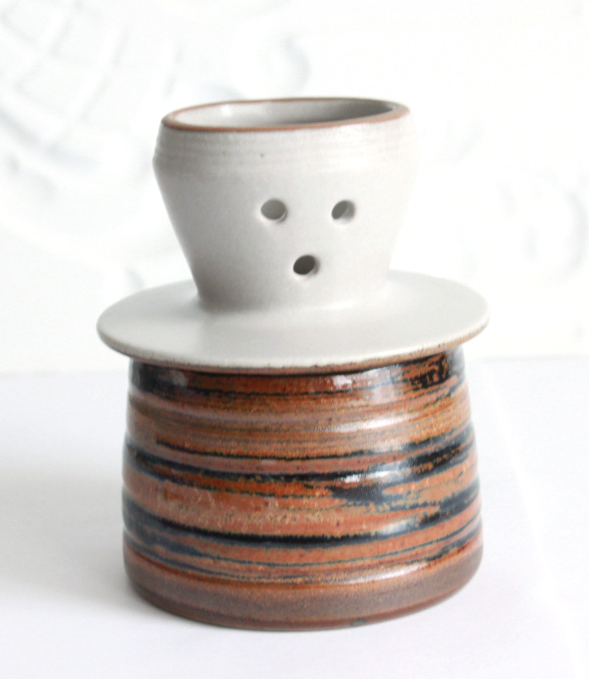 You can find butter crocks at outdoor art shows and galleries. They are