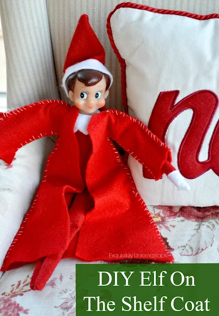 Elf On The Shelf In  A Red Coat With DIY Elf On The Shelf Coat Text
