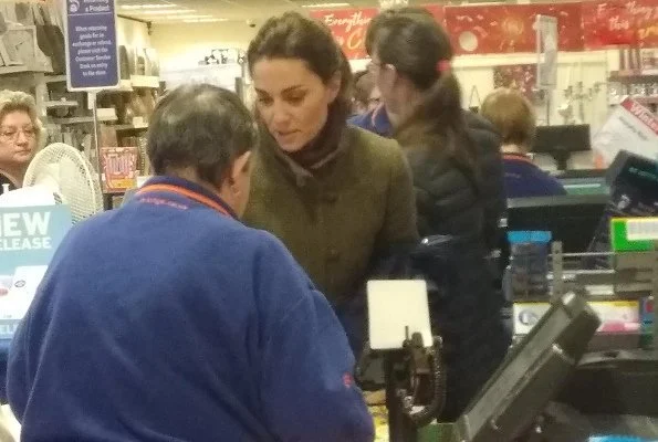 Kate Middleton wore Dubarry Bracken tweed utility jacket. Princess Charlotte and Prince George at at Range store