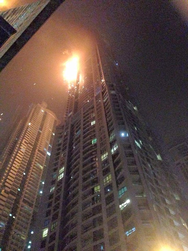 25E547F200000578 2962507 image a 1 1424506569426 Pics: Fire rips through one of the world's tallest residential buildings in Dubai