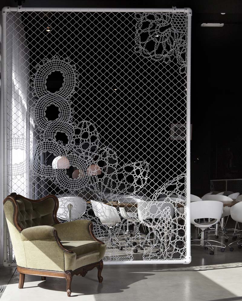 If It's Hip, It's Here (Archives) Turning Chain Link Fencing Into Art