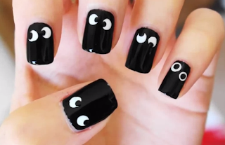 Halloween spooky eyes nail art for girls